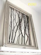 http://cleverlyinspired.blogspot.com/2010/10/garage-sale-frame-my-favorite-piece-of.html