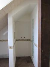 budoucí sprchový kout s luxferovým světlíkem