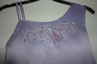 Detail on dress, thinking of taking the flower of and replacing it with a cadburys purple flower
