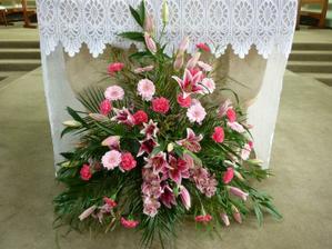Lovely display of flowers at church this weekend - going to have something similar with roses, orchids, lillies, gerberas and lisianthums in red and white xx