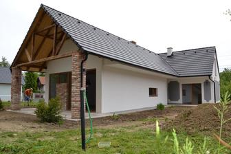 Tak ako väčšina domov v tomto albume je to práca architektov