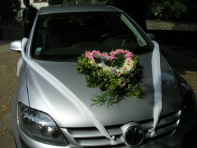Flower heart on the bride's car