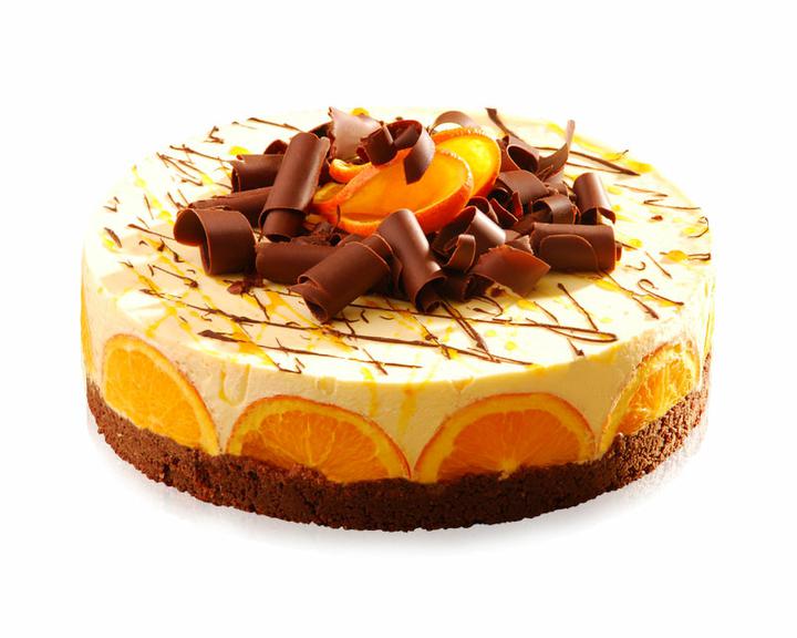 Pššššt.. 2012 - Originální ovocný dort se základnou z čokoládových corn-lupínků pokrytý lehkým tvarohovým krémem s kousky pomeranče a likérem. Povrch je zdoben plátky pomerančů a čoko hoblinkami.