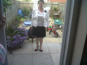 mother of the bride outfit. she could of smiled lol