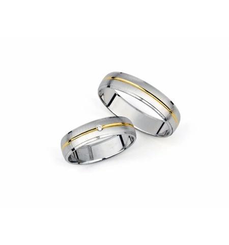 Snubní prsteny se středovými kameny - Lady 
https://lily.cz/snubni-prsteny/stredove-kameny/lady-snubni-prsteny-z-kombinovaneho-zlata