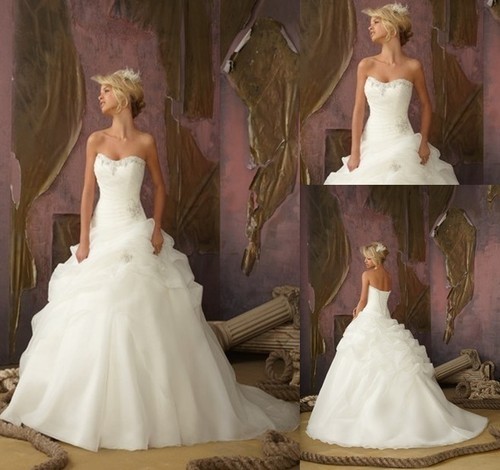 Nové svatební šaty na prodej - vel.38-3800kč