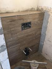 Wc v apartmane oblozene